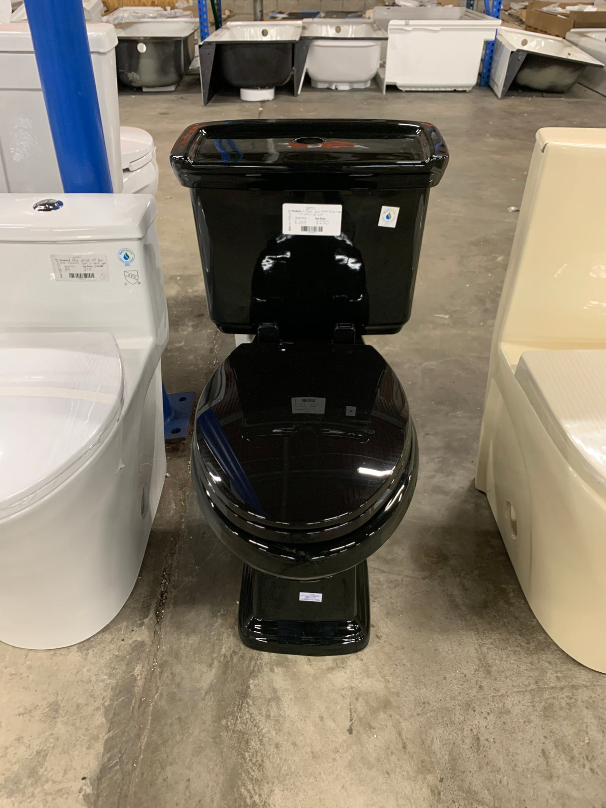 2-piece 1.0 GPF/1.28 GPF High Efficiency Dual Flush Elongated Toilet in Black, Seat Included