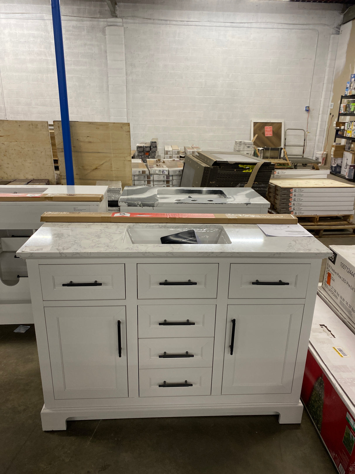 Doveton 48 in. W x 19 in. D x 34 in. H Single Sink Bath Vanity in White with White Engineered Marble Top