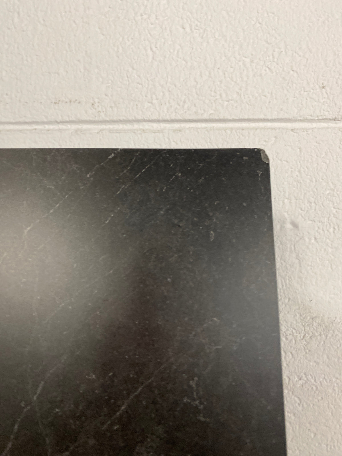 8 ft. L x 25 in. D Engineered Composite Countertop in Black Amani with Satin Finish
