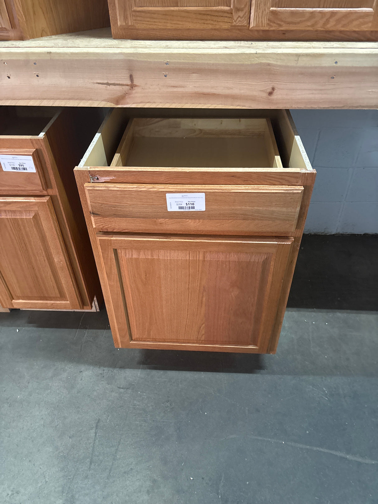 Hampton Medium Oak Raised Panel Stock Assembled Base Kitchen Cabinet with Drawer Glides (24 in. x 34.5 in. x 24 in.)