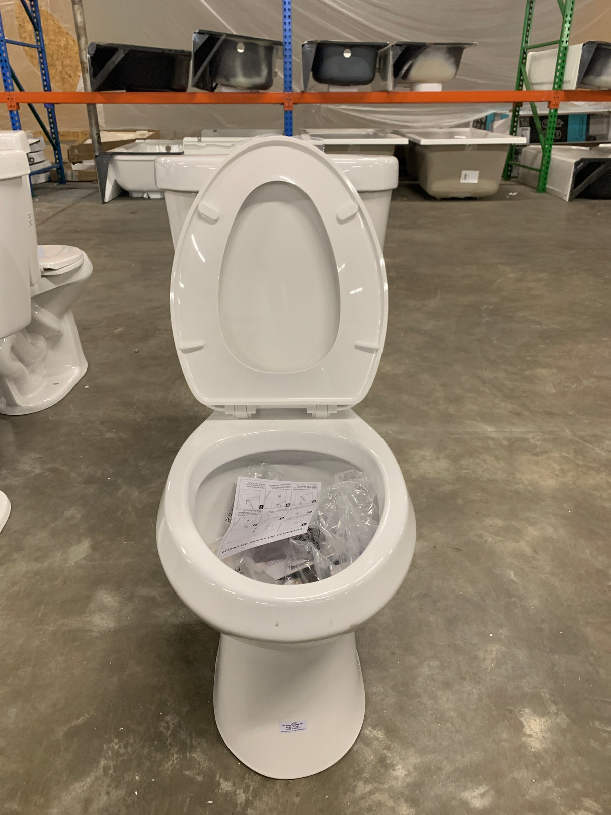 2-piece 1.1 GPF/1.6 GPF High Efficiency Dual Flush Complete Elongated Toilet in White, Seat Included