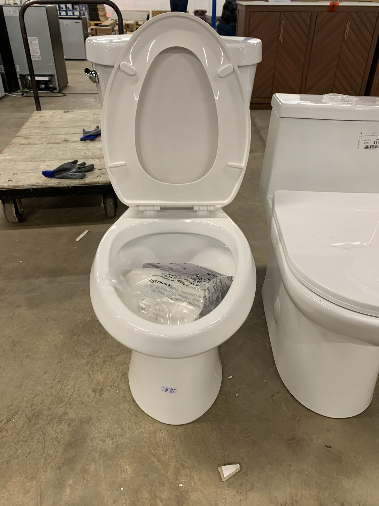 10 in. Rough in. 2-Piece 1.28 GPF Single Flush Elongated Toilet in White, Seat Included