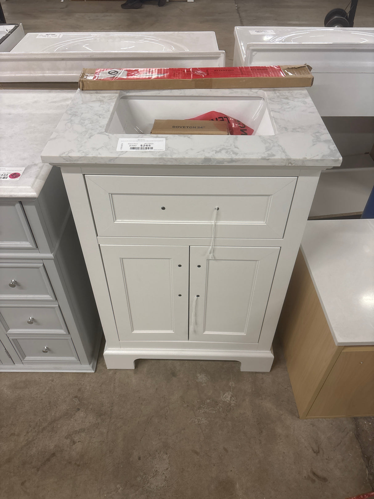 Doveton 24 in. W x 19 in. D x 34 in. H Single Sink Bath Vanity in White with White Engineered Marble Top