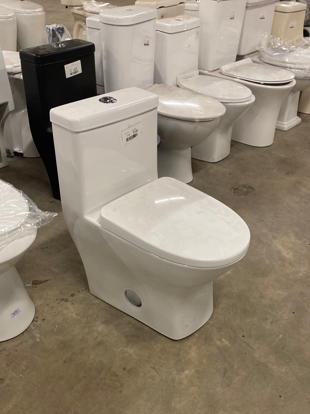 Sublime II 1-Piece 0.8/1.28 GPF Dual Flush Compact Toilet in White, Seat Included