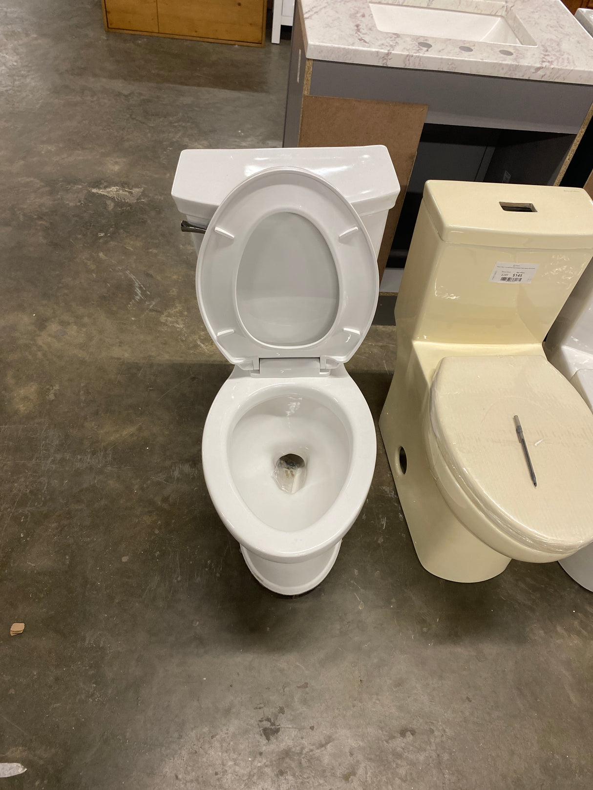 Champion Tall Height 2-Piece High-Efficiency 1.28 GPF Single Flush Elongated Toilet in White Seat Included