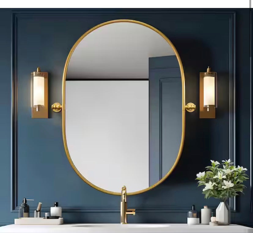 23 in. W x 31 in. H Oval Metal Framed Pivoted Bathroom Wall Vanity Mirror in Gold
