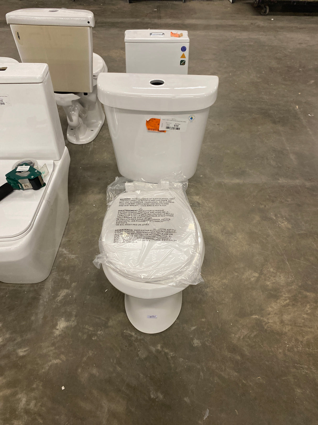 2-piece 1.1 GPF/1.6 GPF Dual Flush Round Toilet in White