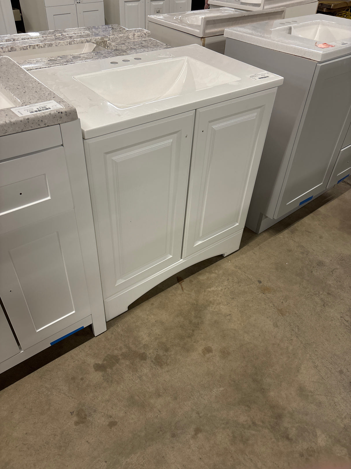 31 in. W x 19 in. D x 35 in. H Single Sink Freestanding Bath Vanity in White with White Cultured Marble Top