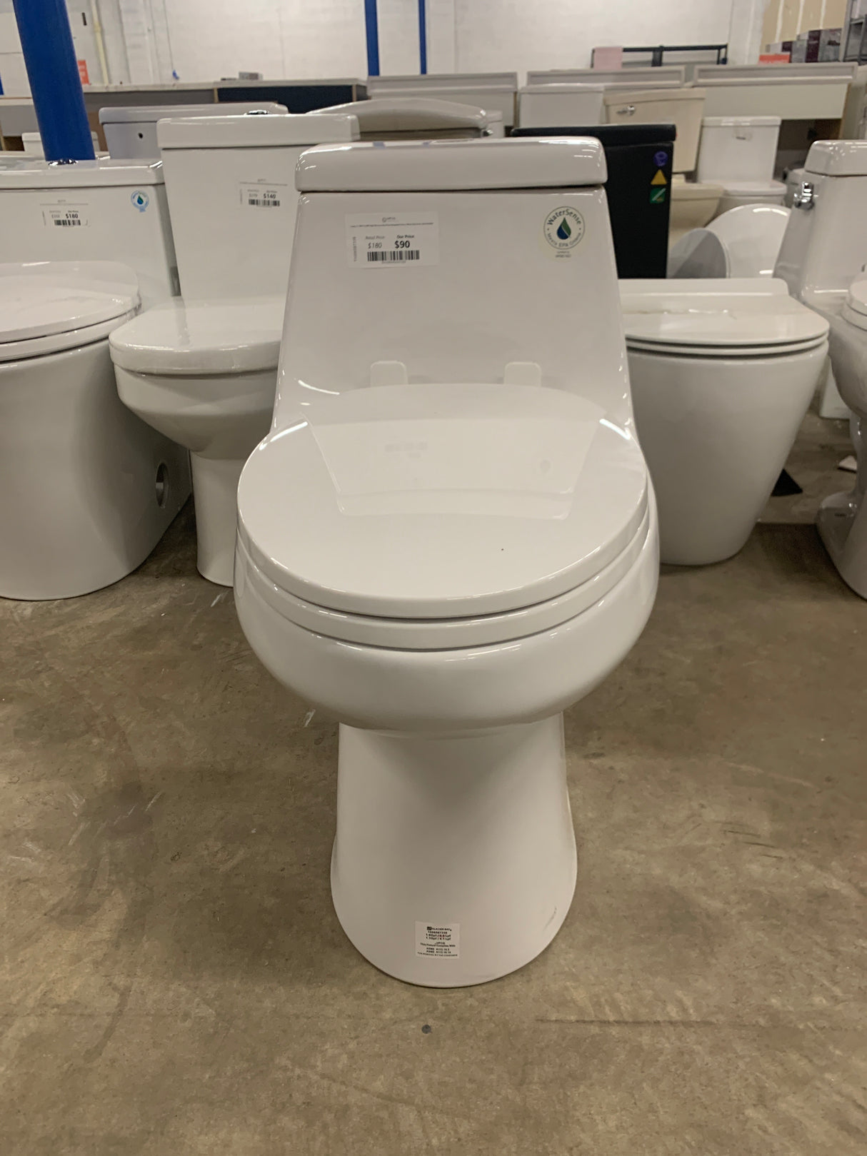 1-piece 1.1 GPF/1.6 GPF High Efficiency Dual Flush Elongated Toilet in White Slow-Close, Seat Included