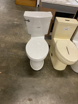 Champion Tall Height 2-Piece High-Efficiency 1.28 GPF Single Flush Elongated Toilet in White Seat Included