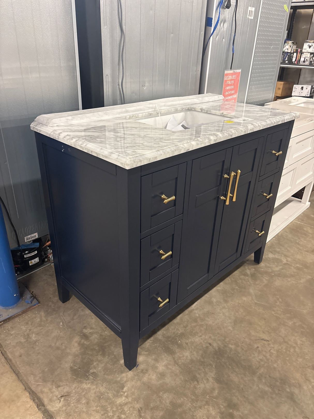 Sturgess 43 in. W x 22 in. D x 35 in. H Single Sink Freestanding Bath Vanity in Navy Blue with Carrara Marble Top ( Comes With One Free Toilet Or Mirror Valued Up To $100)