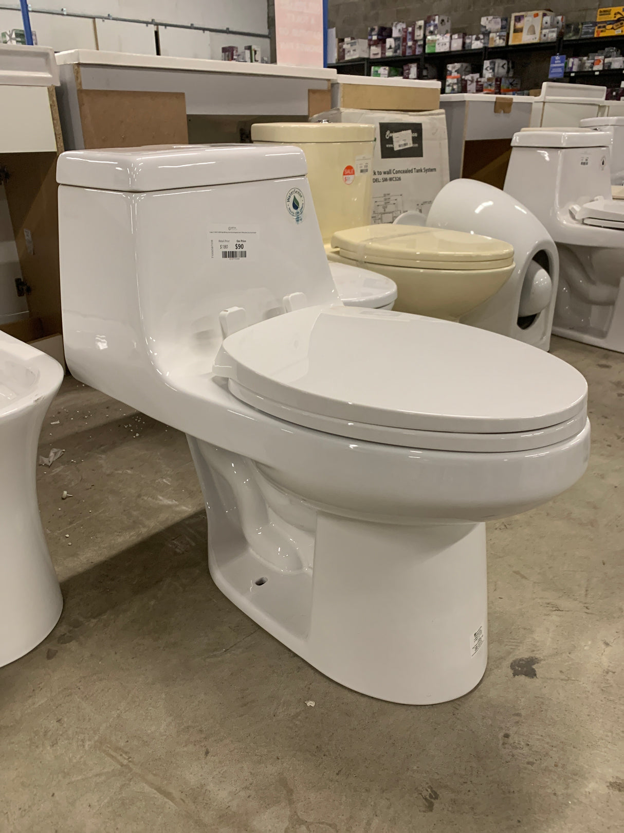 1-piece 1.1 GPF/1.6 GPF High Efficiency Dual Flush Elongated Toilet in White Slow-Close, Seat Included