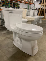 Power Flush 1-piece 1.28 GPF Single-Flush Elongated Toilet in White Seat Included