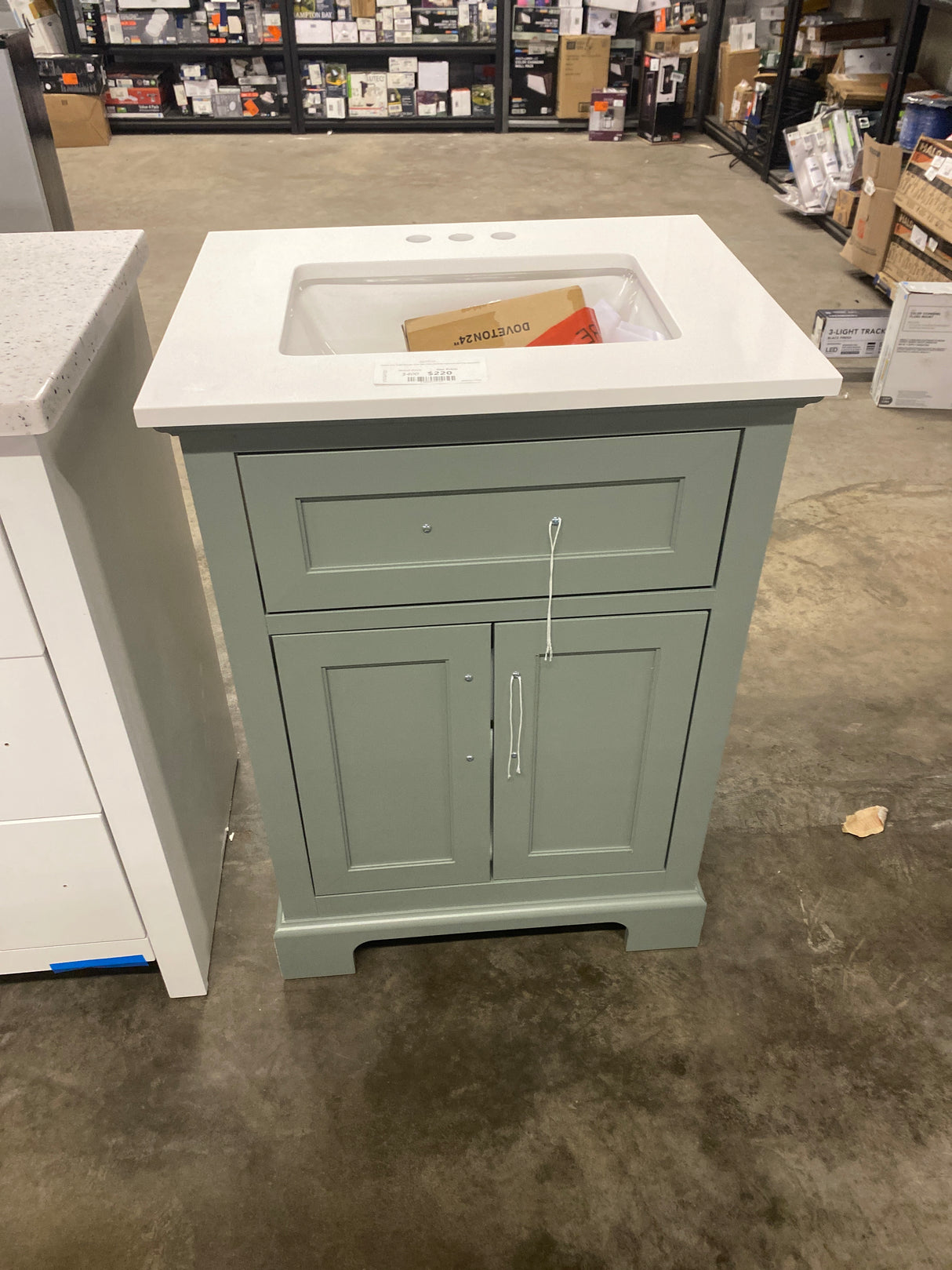 Doveton 24 in. Single Sink Sage Green Bath Vanity with White Engineered Stone Top (Assembled)