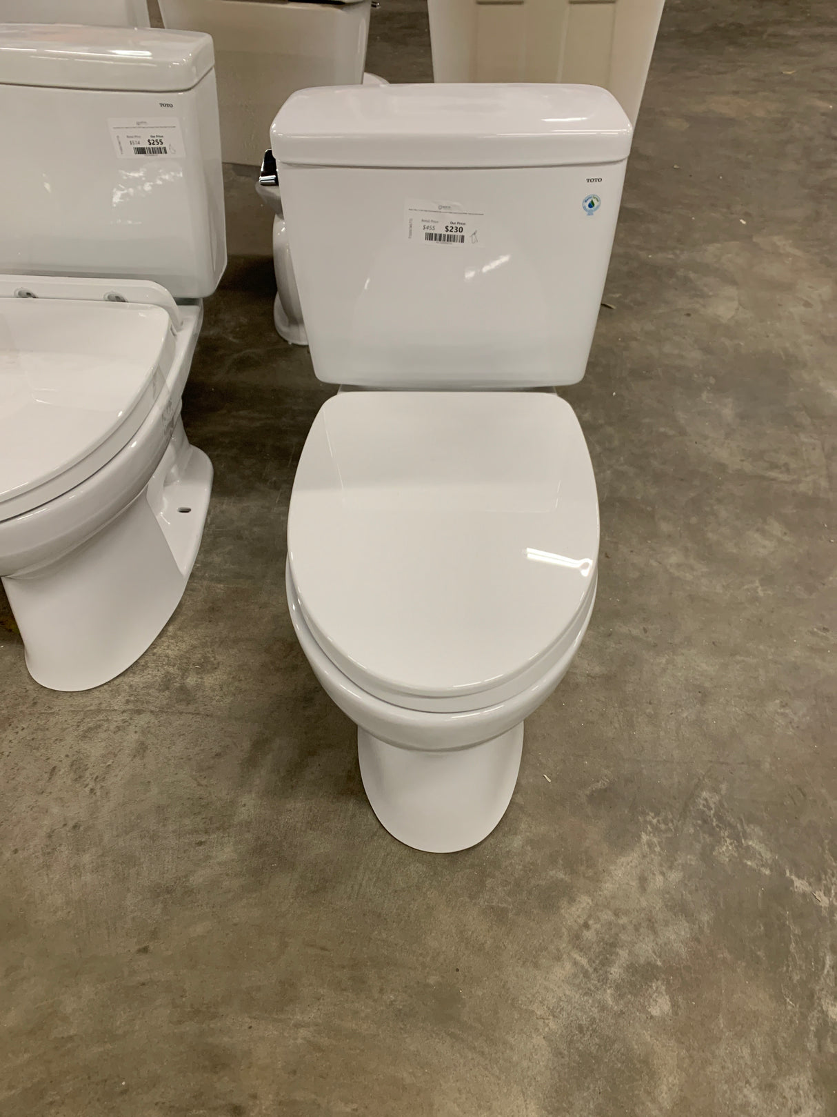 Drake 2-Piece 1.6 GPF Single Flush Elongated ADA Comfort Height Toilet in Cotton White, SoftClose Seat Included