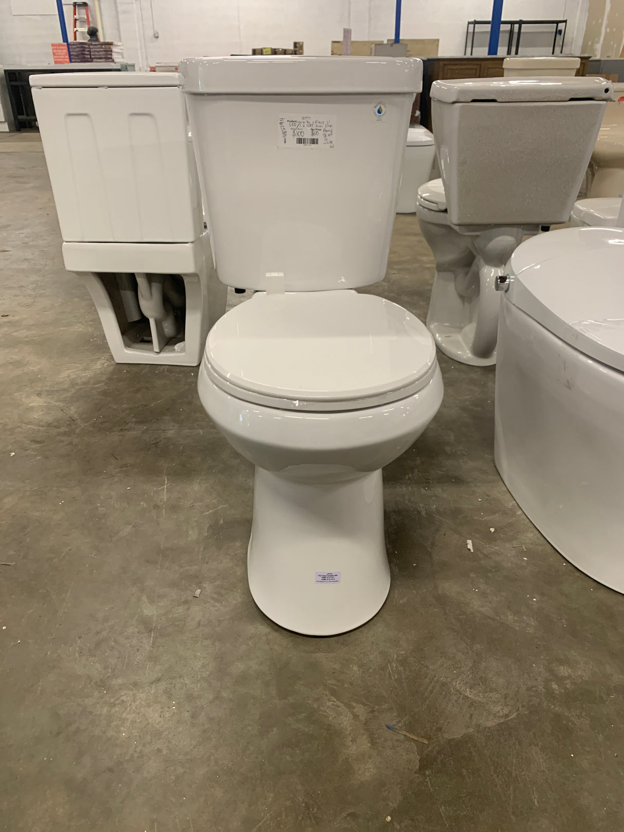 2-piece 1.1 GPF/1.6 GPF Dual Flush Round Toilet in White