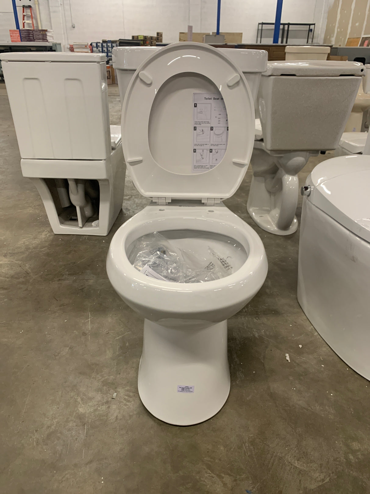 2-piece 1.1 GPF/1.6 GPF Dual Flush Round Toilet in White