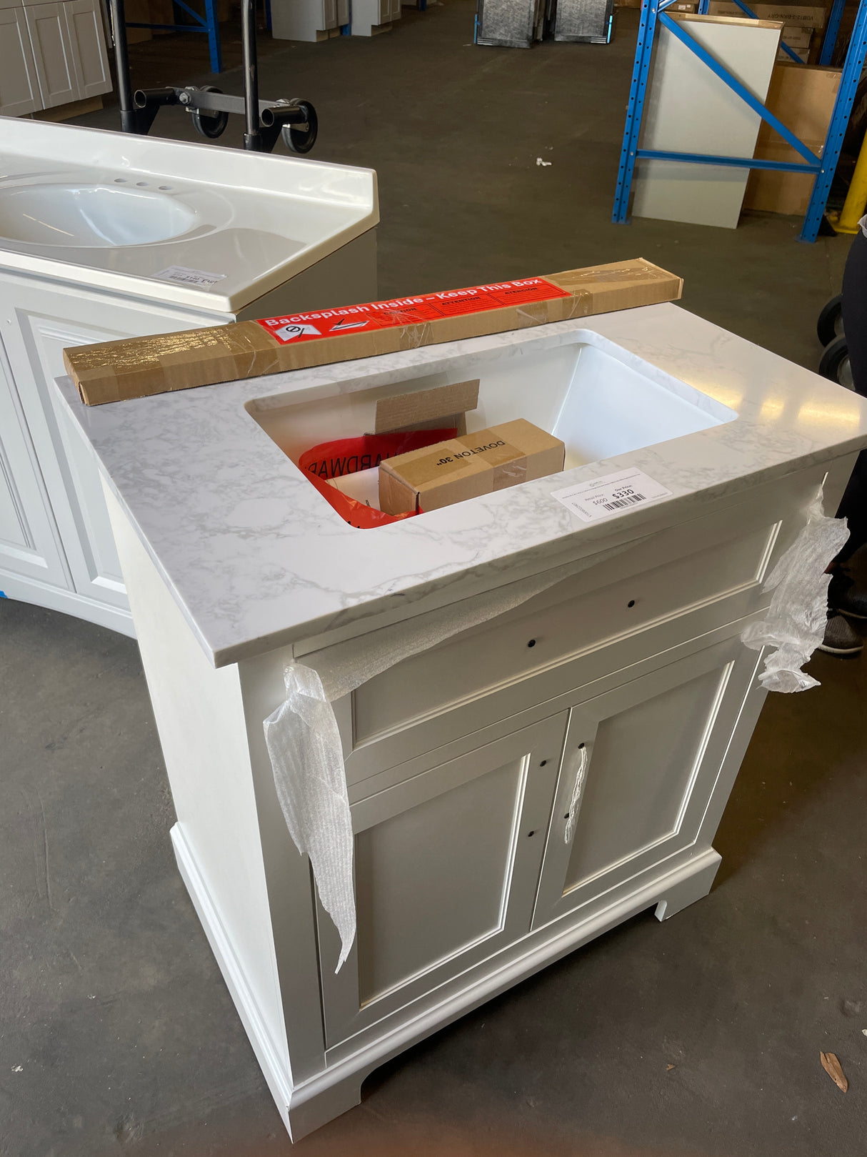 Doveton 30 in. W x 19 in. D x 34.5 in. H Single Sink Bath Vanity in White with White Engineered Stone Top