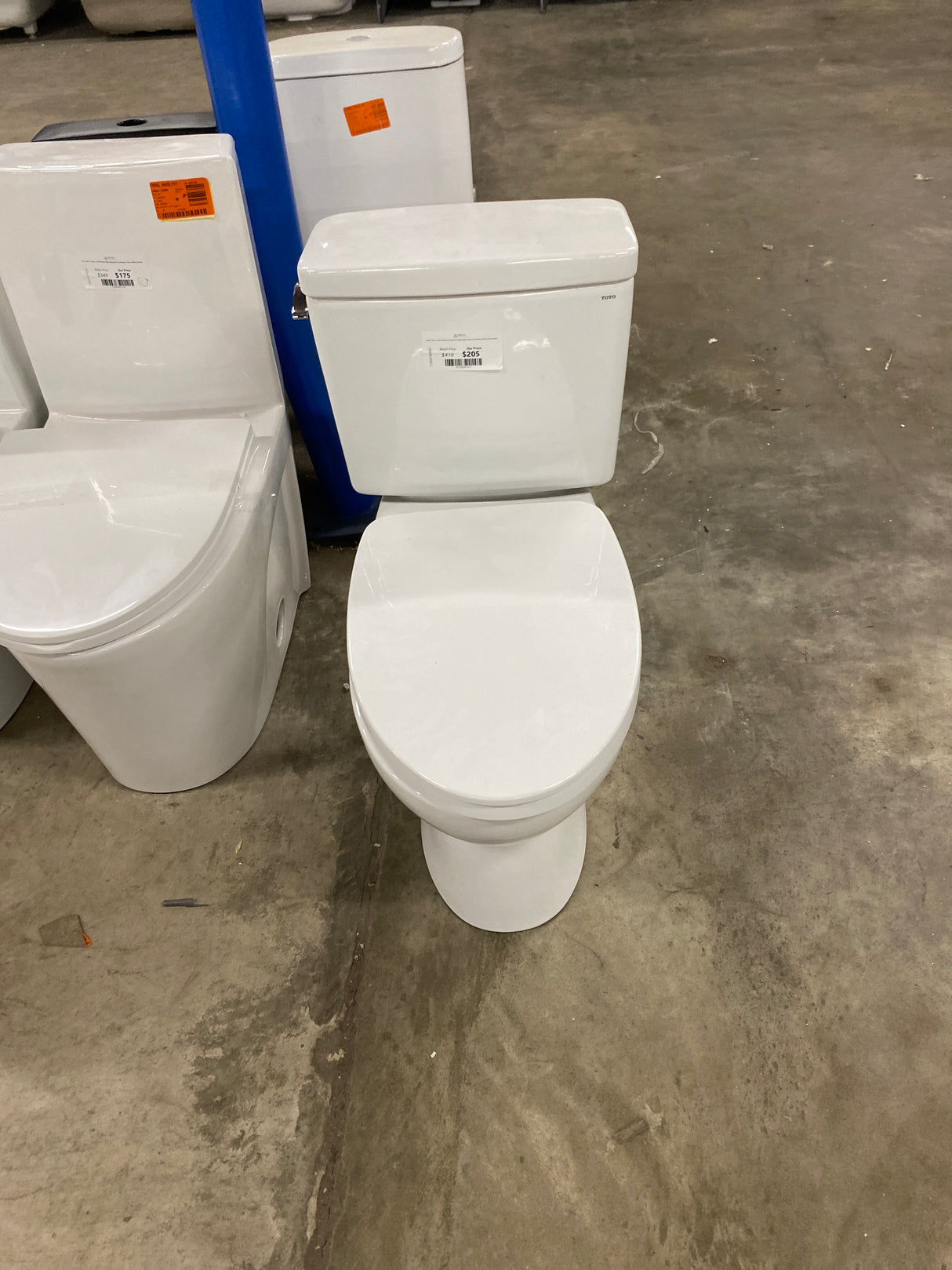 Drake 2-Piece 1.6 GPF Single Flush Elongated Standard Height Toilet in Cotton White, SoftClose Seat Included