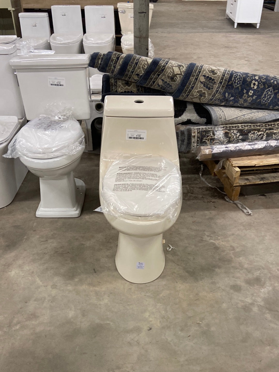 1-Piece 1.1 GPF/1.6 GPF High Efficiency Dual Flush Elongated All-in-One Toilet in Bone