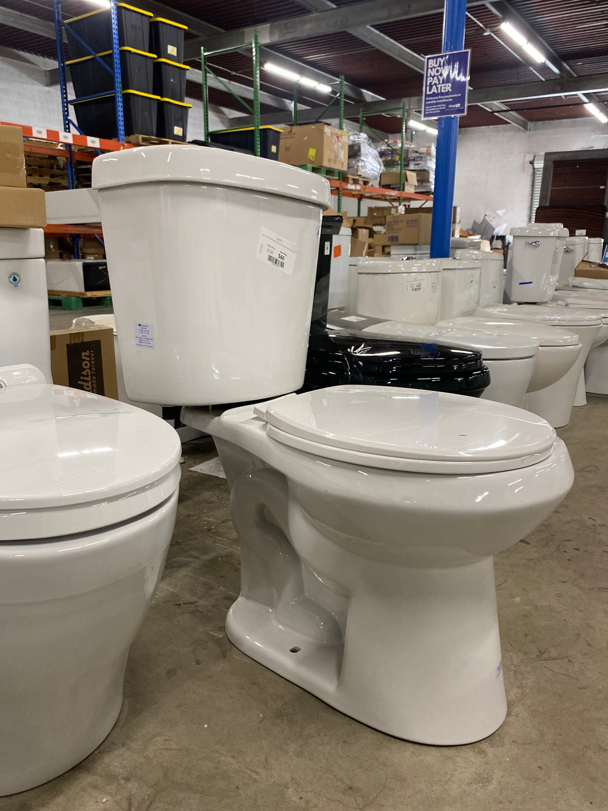 2-piece 1.1 GPF/1.6 GPF High Efficiency Dual Flush Complete Elongated Toilet in White, Seat Included