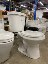 2-piece 1.1 GPF/1.6 GPF High Efficiency Dual Flush Complete Elongated Toilet in White, Seat Included