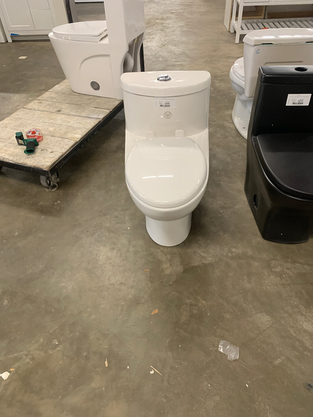 Tofino Complete 1-Piece 1.1 GPF Dual Flush Elongated Toilet in White with Slow Close Seat