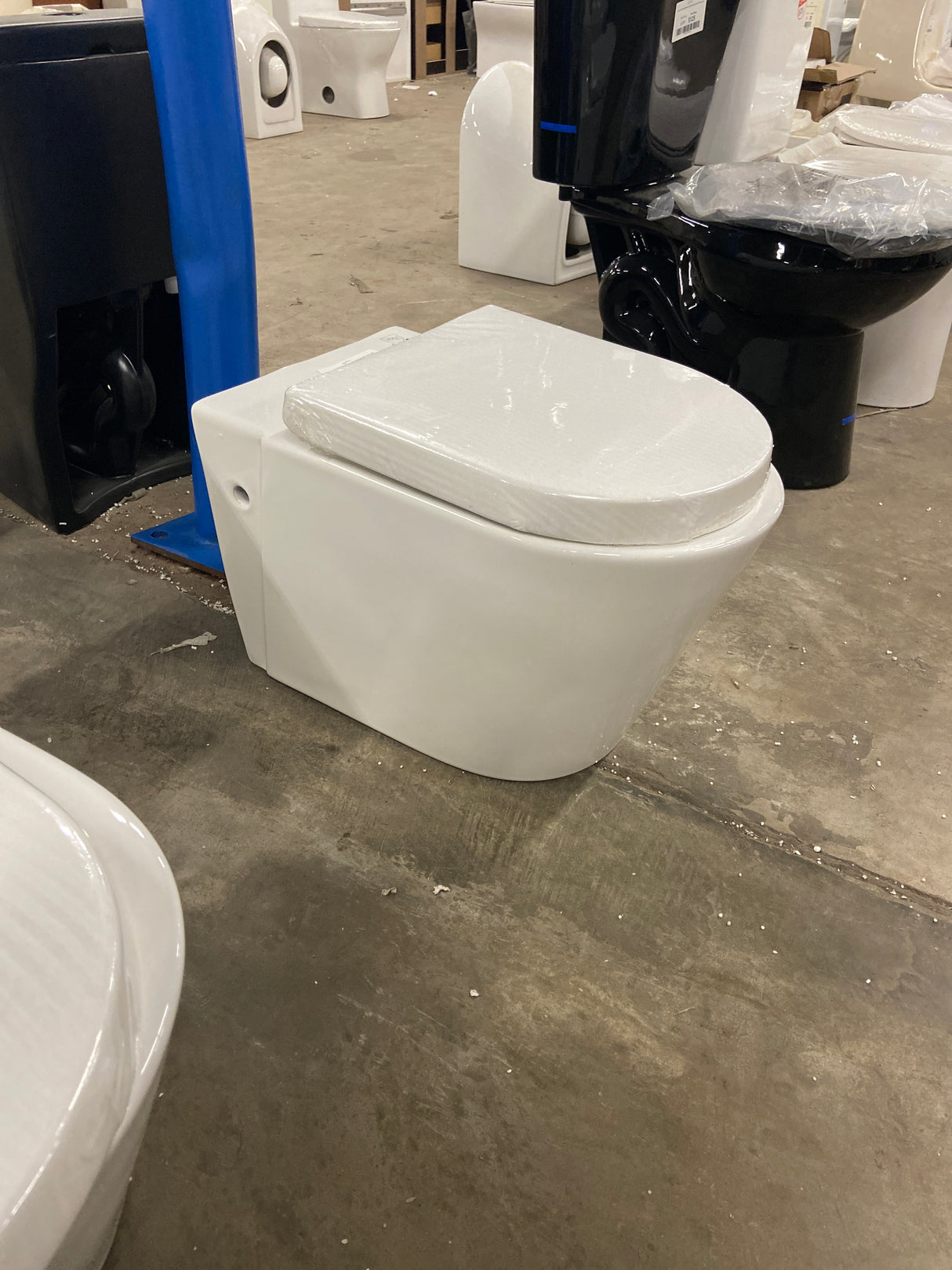 Wall Hung Toilet Bowl Only 0.8/1.28 GPF Dual Flush Round in White, Seat Included