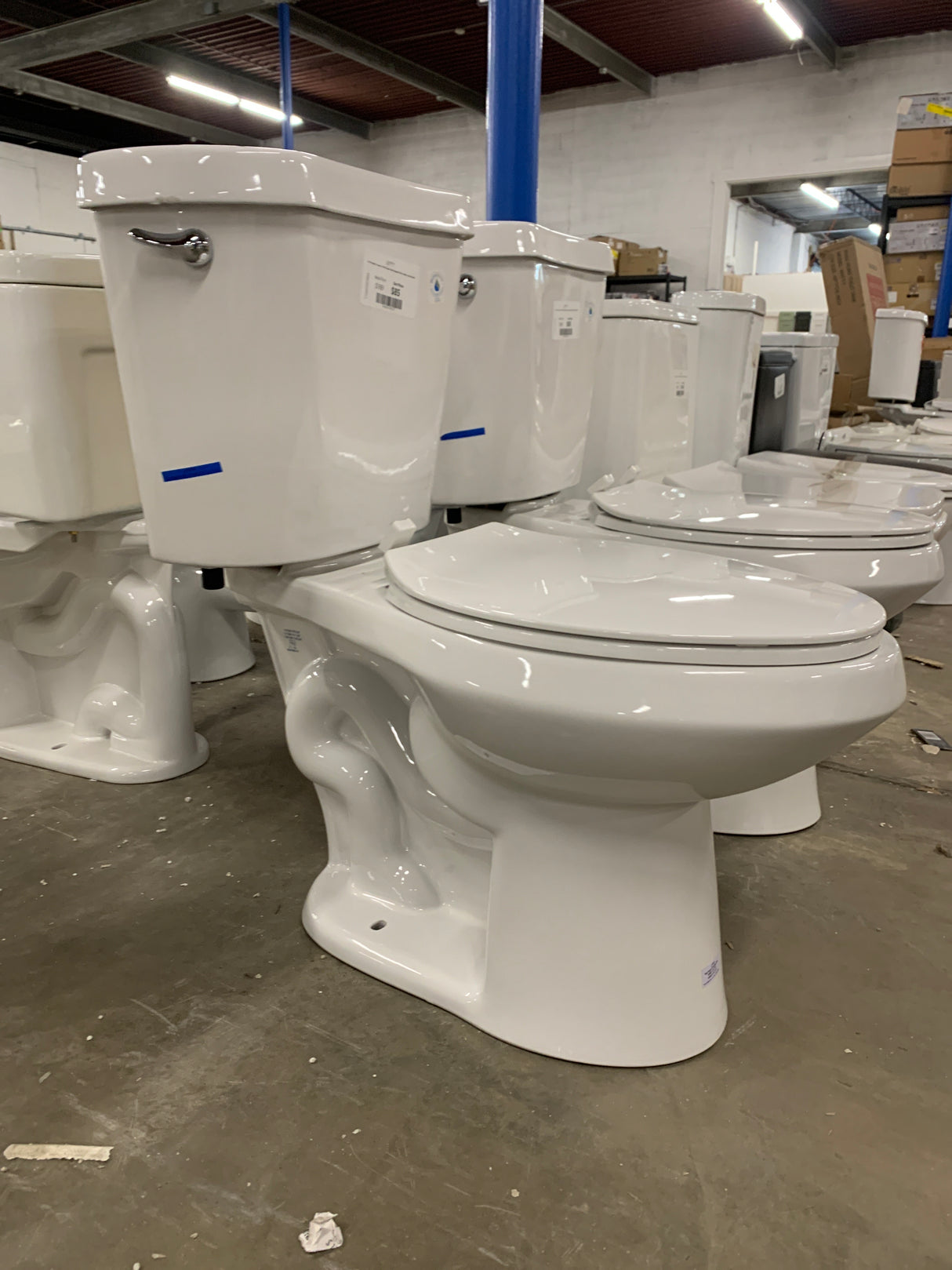 10 in. Rough-In 2-piece 1.28 GPF Single Flush Elongated Toilet in White, Seat Included