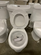 2-piece 1.1 GPF/1.6 GPF Dual Flush Round Toilet in White