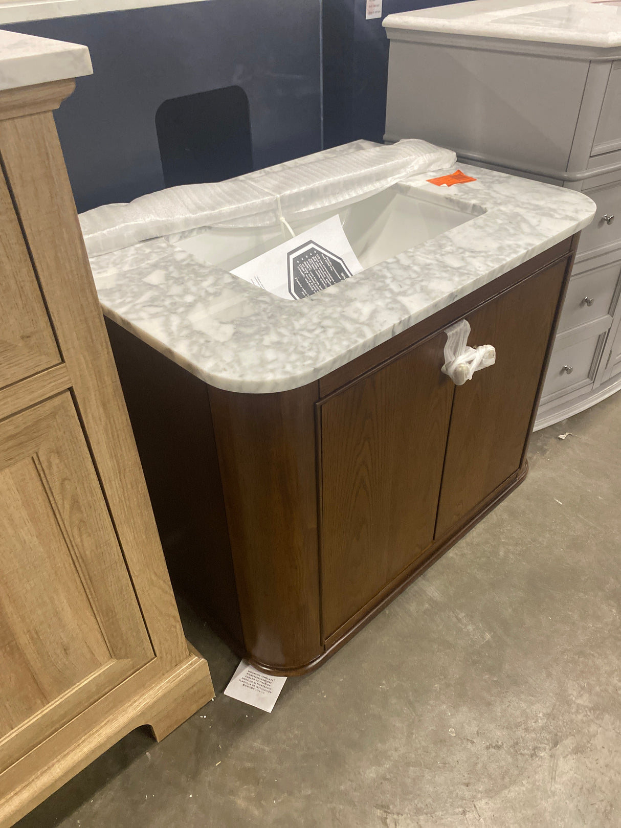 Collette 30 in W x 22 in D x 35 in H Single Sink Bath Vanity in Cinnamon Oak With White Carrara Marble Top