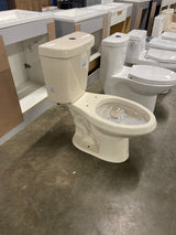 2-Piece 1.1 GPF/1.6 GPF High Efficiency Dual Flush Elongated Toilet in Bone, Seat Included