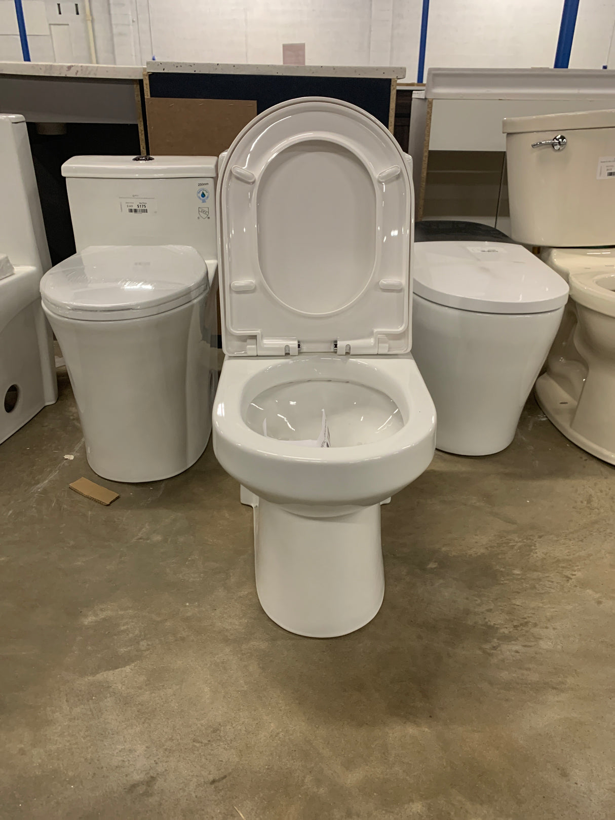 1-piece 0.8/1.28 GPF High Efficiency Dual Flush Round Toilet in. White with Seat Included and Brushed Gold Button