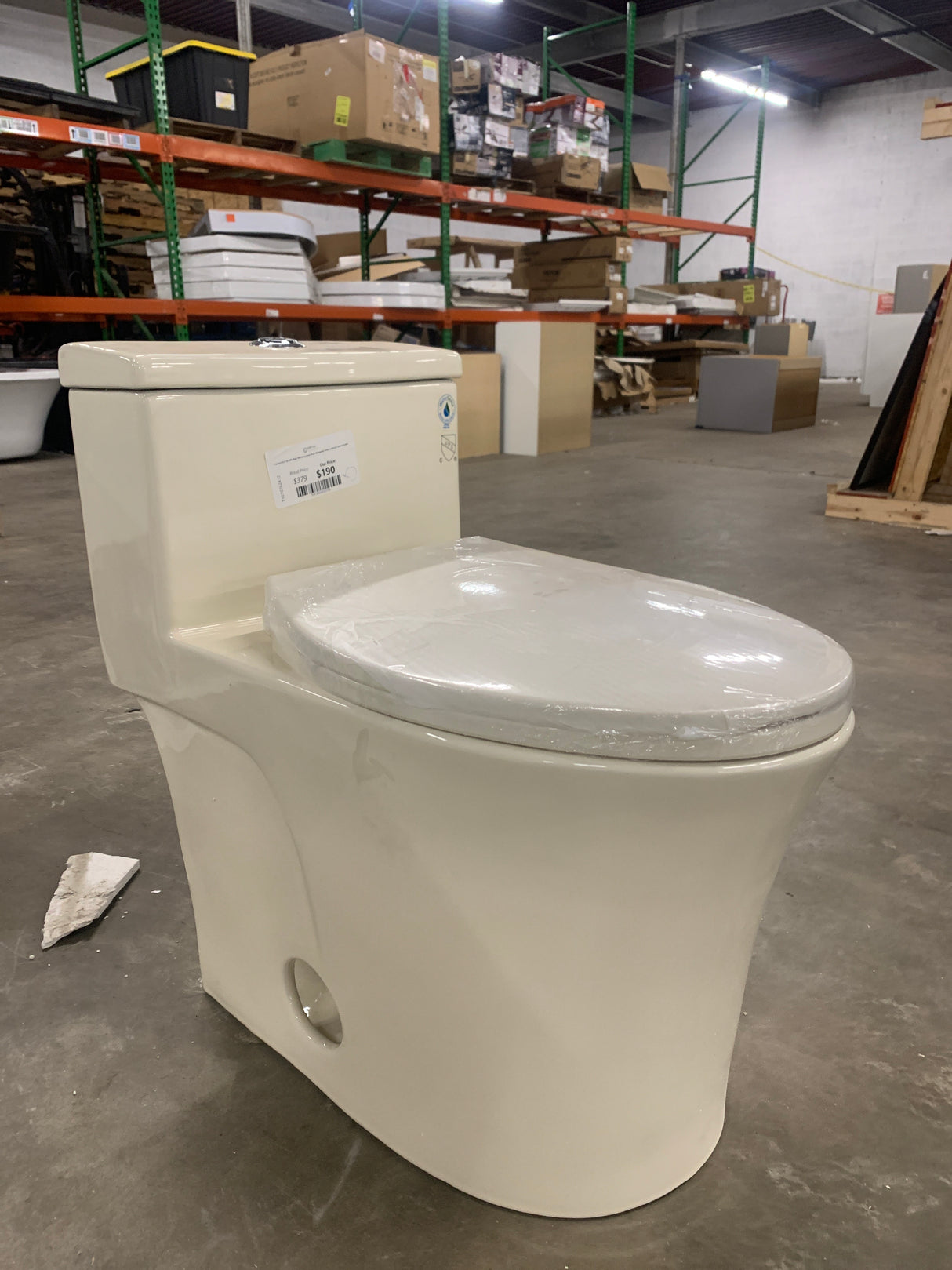 1-piece 0.8/1.28 GPF High Efficiency Dual Flush Elongated Toilet in Biscuit, Seat Included