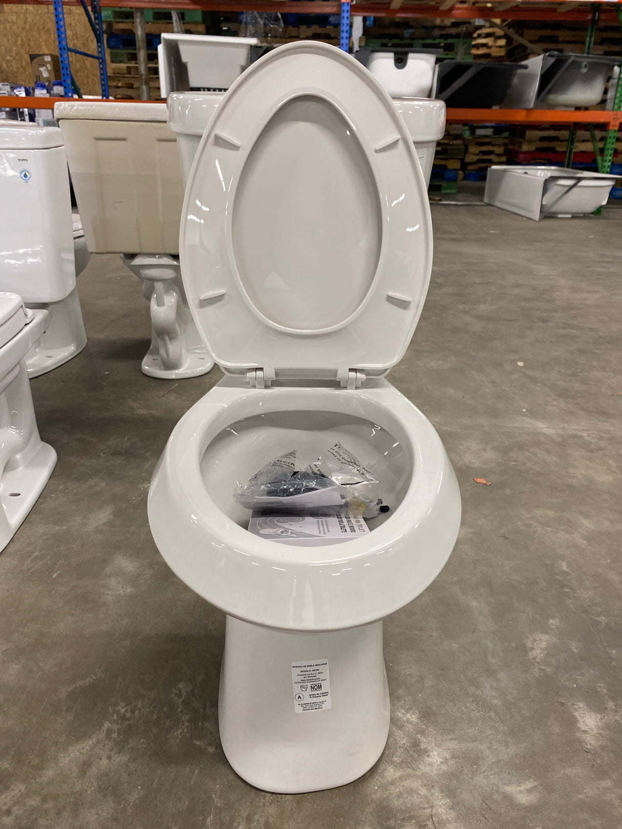 2-piece 1.1 GPF/1.6 GPF High Efficiency Dual Flush Complete Elongated Toilet in White, Seat Included