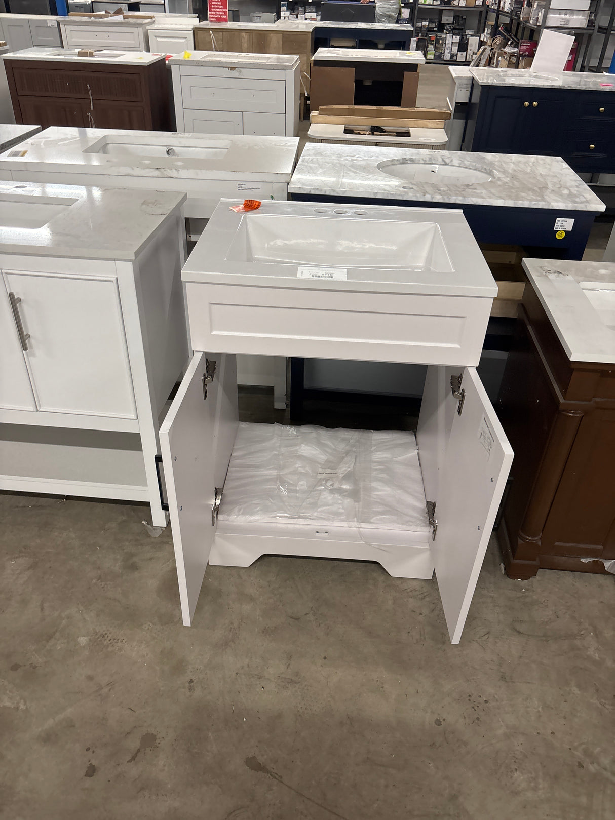 Southfield 25 in. Single Sink Freestanding Bathroom Vanity in White with Engineered Solid Surface Top (Assembled)