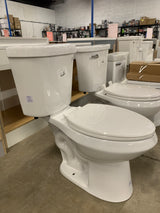 2-piece 1.1 GPF/1.6 GPF High Efficiency Dual Flush Complete Elongated Toilet in White, Seat Included