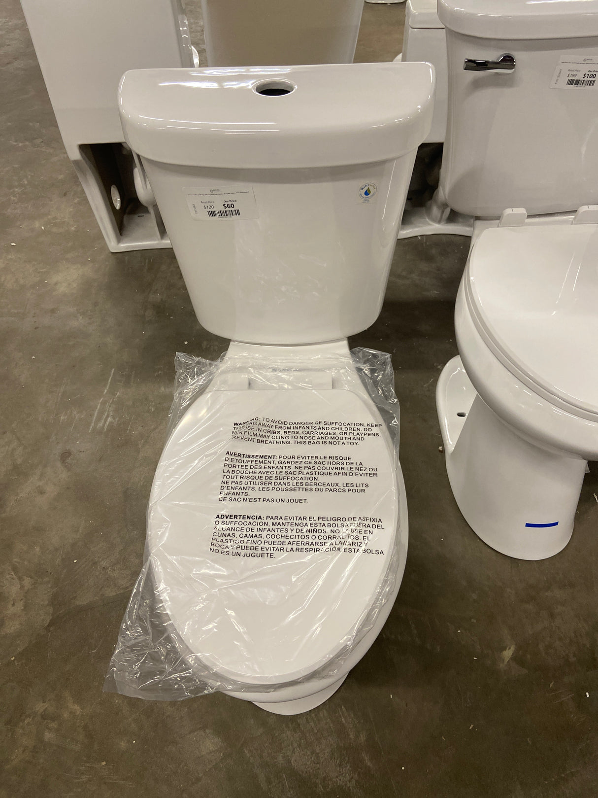 2-piece 1.1 GPF/1.6 GPF High Efficiency Dual Flush Complete Elongated Toilet in White, Seat Included