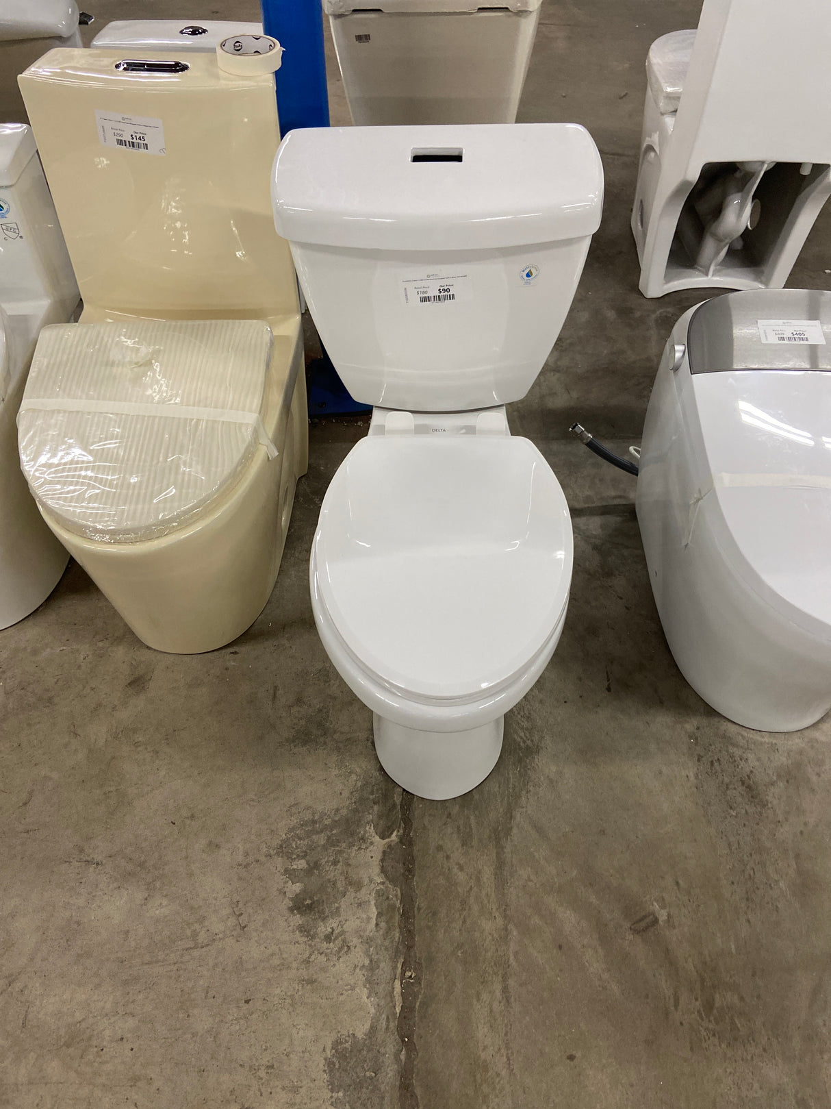 Foundations 2-piece 1.1 GPF/1.6 GPF Dual Flush Elongated Toilet in White, Seat Included