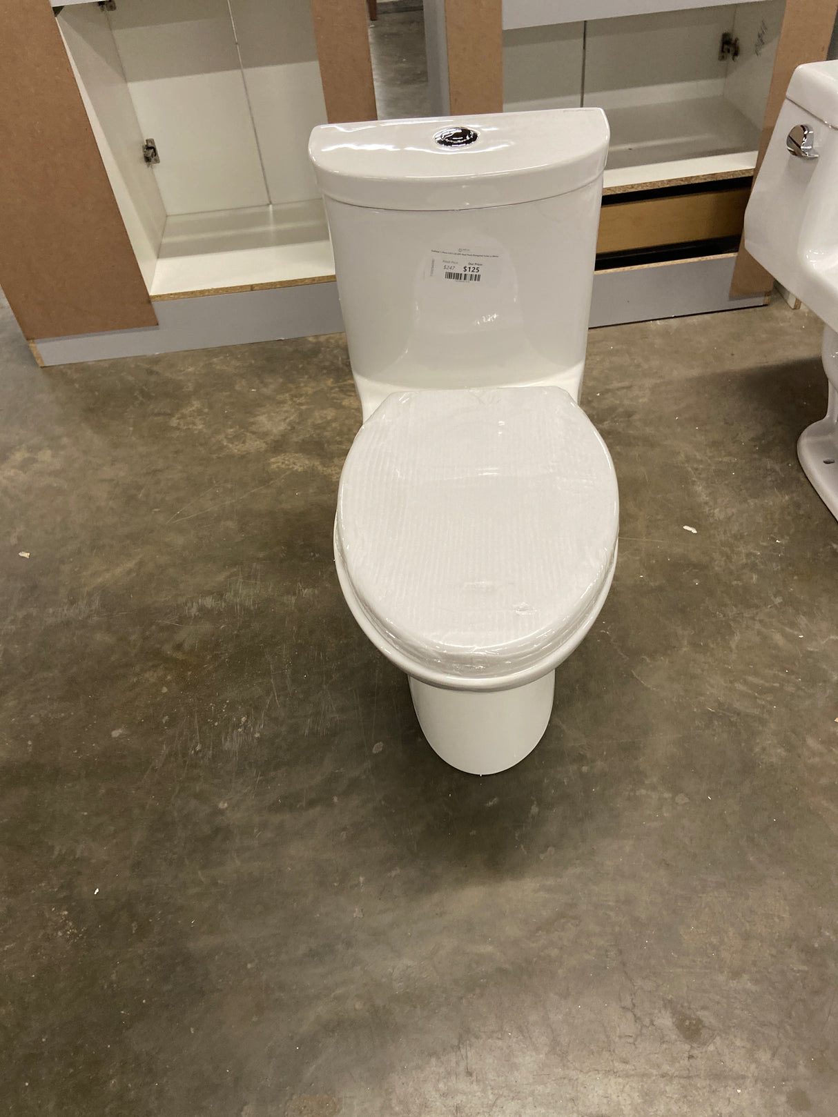 Sublime 1-Piece 0.8/1.28 GPF Dual Flush Elongated Toilet in White