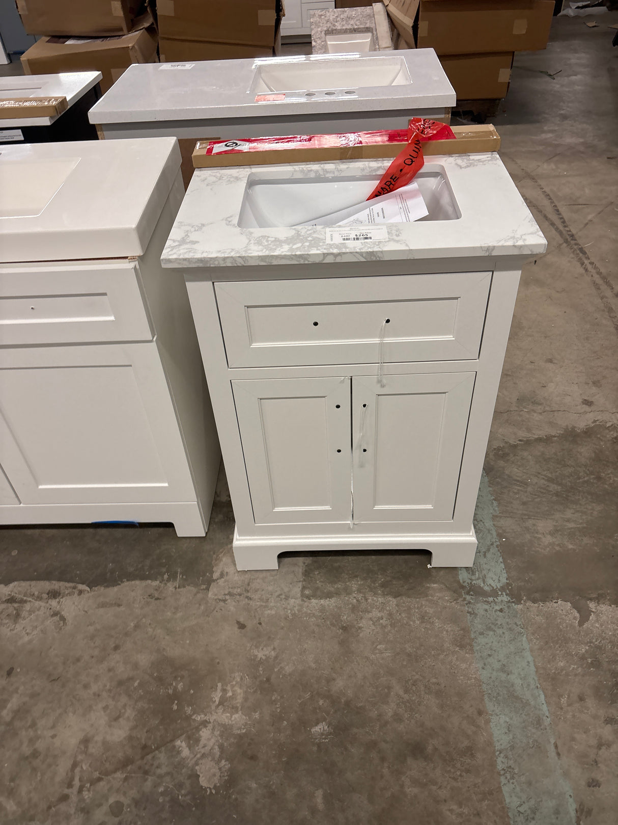 Doveton 24 in. W x 19 in. D x 34 in. H Single Sink Bath Vanity in White with White Engineered Marble Top