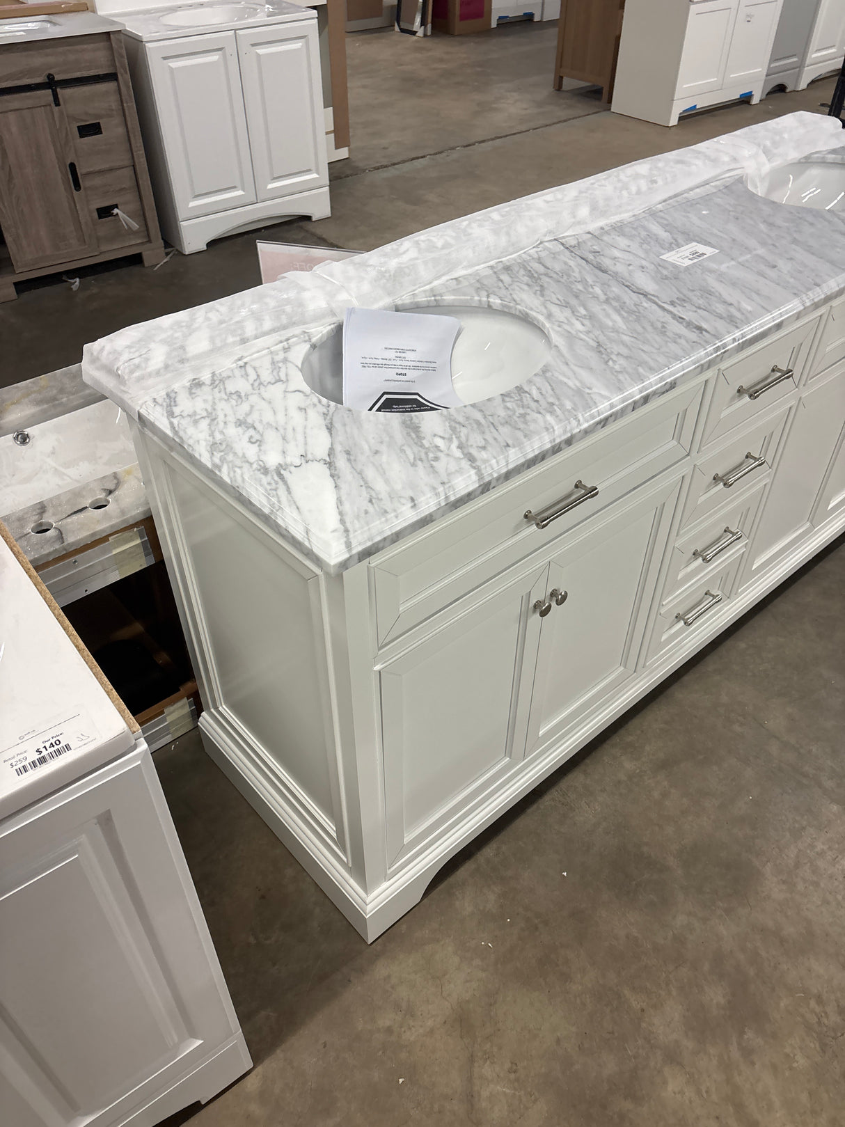 Windlowe 73 in. W x 22 in. D x 35 in. H Bath Vanity in White with Carrara Marble Vanity Top in White with White Sink