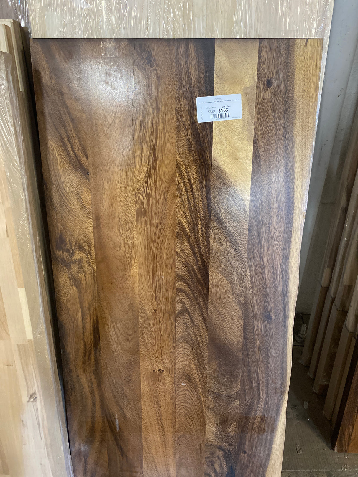 4 ft. L x 25 in. D Finished Saman Solid Wood Butcher Block Countertop With Live Edge