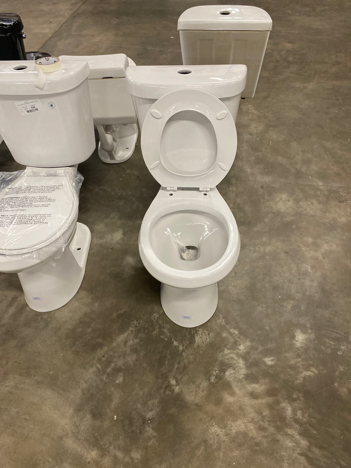 2-piece 1.1 GPF/1.6 GPF Dual Flush Round Toilet in White