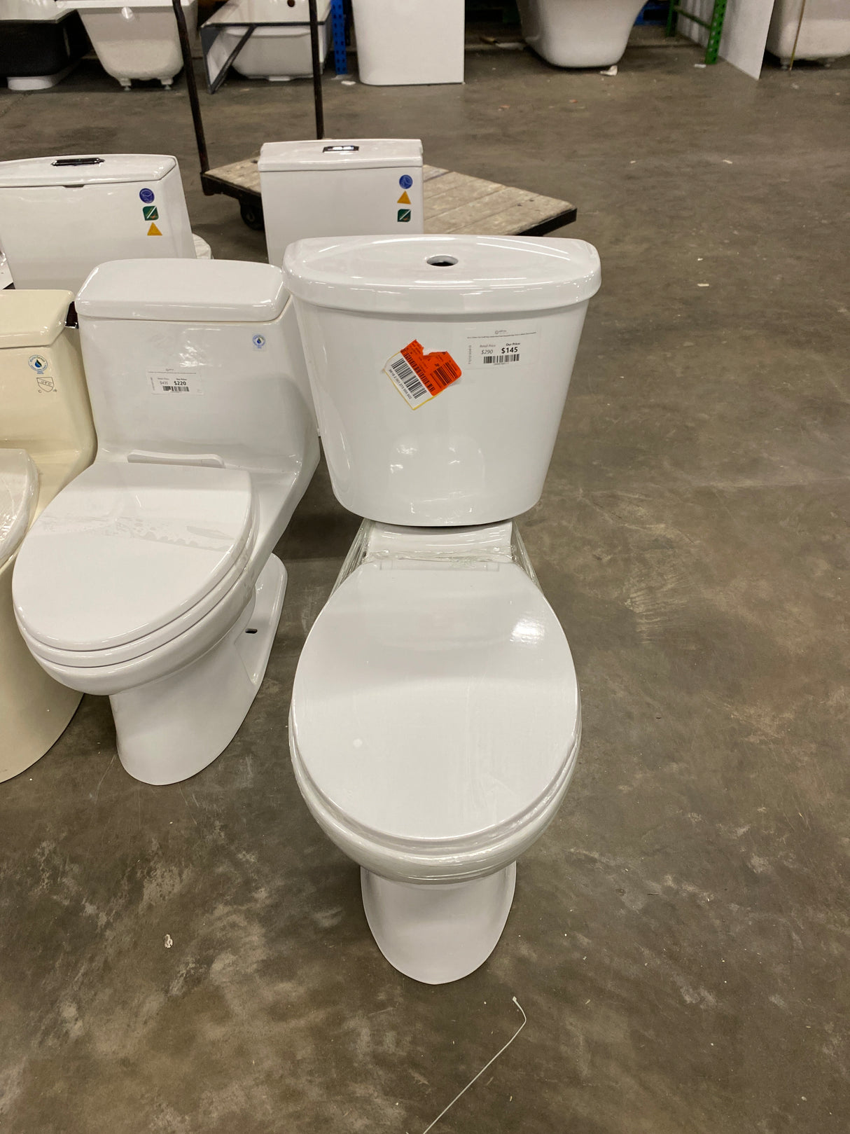 19 in. 2-Piece 1.0/1.6 GPF Rear-Outlet Dual Flush Elongated High Toilet in White (Seat Included)