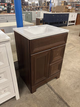 Sedgewood 24.5 in. W x 18.75 in. D x 34.375 in. H Single Sink Bath Vanity in Dark Cognac with Arctic Solid Surface Top