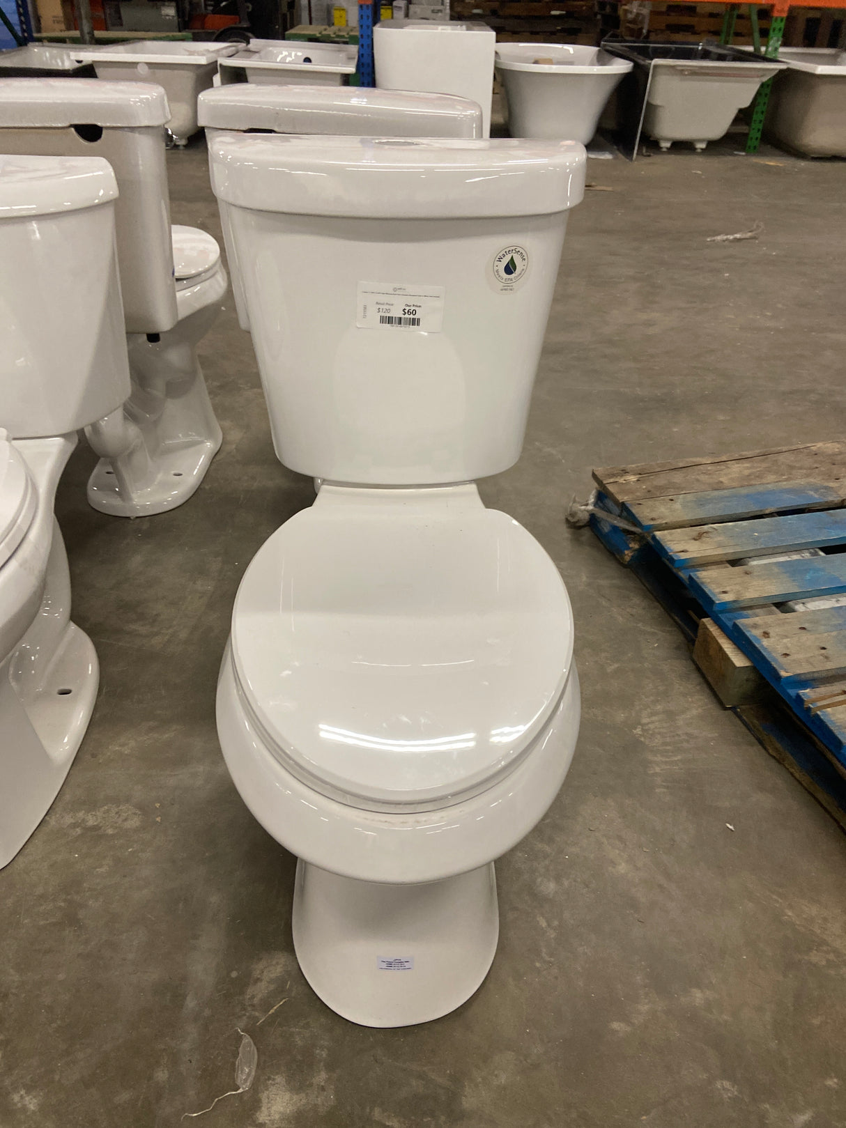 2-piece 1.1 GPF/1.6 GPF High Efficiency Dual Flush Complete Elongated Toilet in White, Seat Included