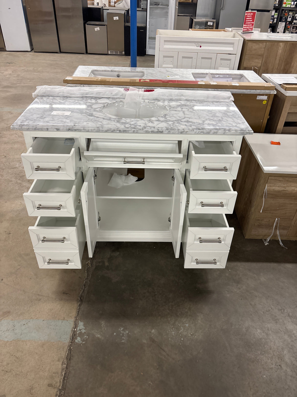 Windlowe 49 in. W x 22 in. D x 35 in. H Freestanding Bath Vanity in White with Carrara White Marble Top