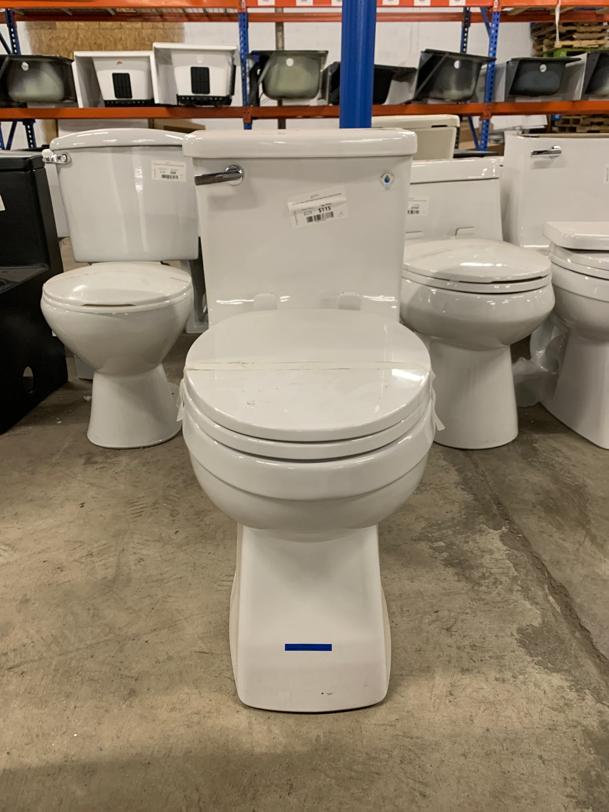 Power Flush 1-piece 1.28 GPF Single-Flush Elongated Toilet in White Seat Included