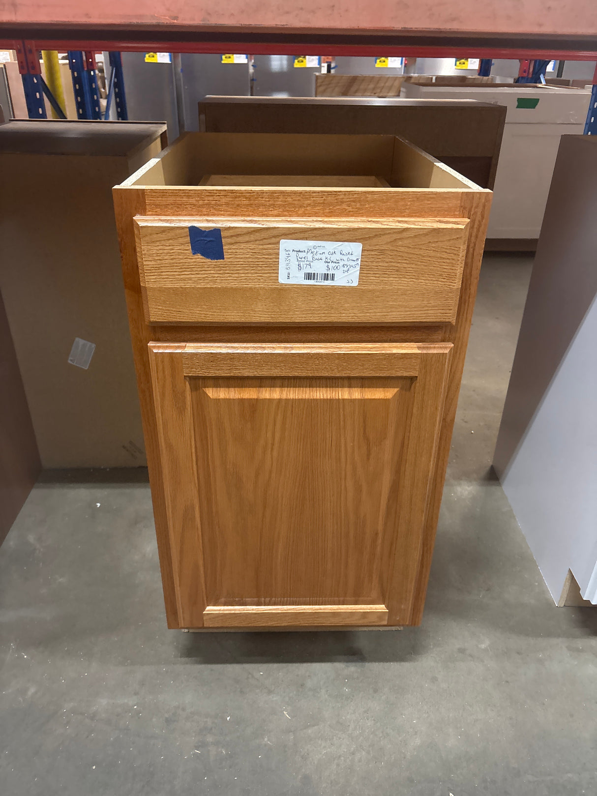 Hampton Medium Oak Raised Panel Stock Assembled Base Kitchen Cabinet with Drawer Glides (18 in. x 34.5 in. x 24 in.)